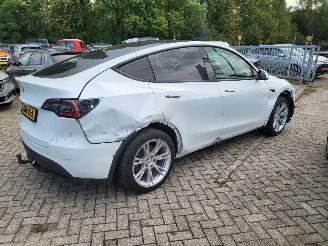 Tesla  Tesla MODEL Y RWD 58 kWh range 455km nwprijs € 45000 picture 7