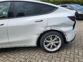 Tesla  Tesla MODEL Y RWD 58 kWh range 455km nwprijs € 45000 picture 23
