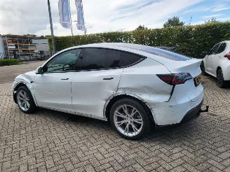 Tesla  Tesla MODEL Y RWD 58 kWh range 455km nwprijs € 45000 picture 5