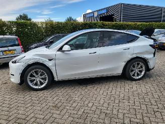 Tesla  Tesla MODEL Y RWD 58 kWh range 455km nwprijs € 45000 picture 19