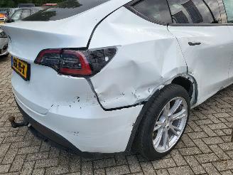 Tesla  Tesla MODEL Y RWD 58 kWh range 455km nwprijs € 45000 picture 21