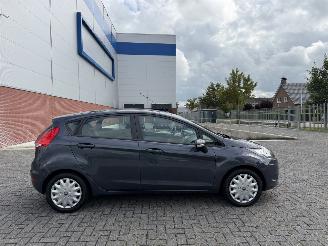 uszkodzony samochody osobowe Ford Fiesta 1.25 Champion AIRCO 2012/12