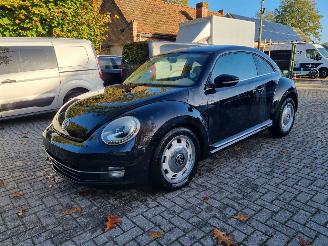 damaged passenger cars Volkswagen Beetle 1.2 TSI Airco Stoelverw. Leder 2013/5