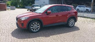 skadebil auto Mazda CX-5 4x4 Navigatie Bose Soundsystem Xenon Leren Sportstoelen-Memory Climatecontrol CruiseControl Stoelverwarming Lichtautomaat Privacyglas keyless Entry trekhaak Parkeersensoren Achteruitrijcamera 2014/7
