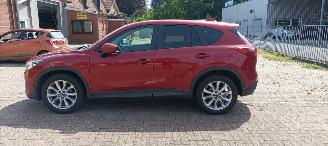 Mazda CX-5 4x4 Navigatie Bose Soundsystem Xenon Leren Sportstoelen-Memory Climatecontrol CruiseControl Stoelverwarming Lichtautomaat Privacyglas keyless Entry trekhaak Parkeersensoren Achteruitrijcamera picture 2