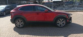 skadebil auto Mazda CX-30 Bj 8-2019 1.8 Climatecontrol Leder Navi Led-Koplampen Led-Achterlichten Stoelverwarming Lichtautomaat Privacyglas keyless Entry Bose Soundsystem elektrische achterklep 2019/8