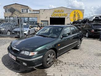 damaged passenger cars Mazda 626 DOHC 1.9 - VALVE 2001/1