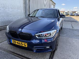 krockskadad bil auto BMW 1-serie 118i Sport Line Automaat 2019/4