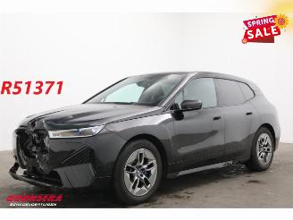 Vaurioauto  passenger cars BMW iX xDrive50 112 kWh LED ACC HUD 360° H/K Memory Ventilatie AHK 2024/3