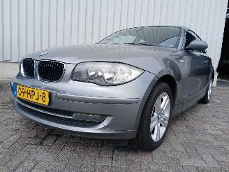 krockskadad bil auto BMW 1-serie 1 serie (E81) Hatchback 3-drs 116i 1.6 16V (N43-B16A) [90kW]  (03-2007=
/12-2011) 2009/1